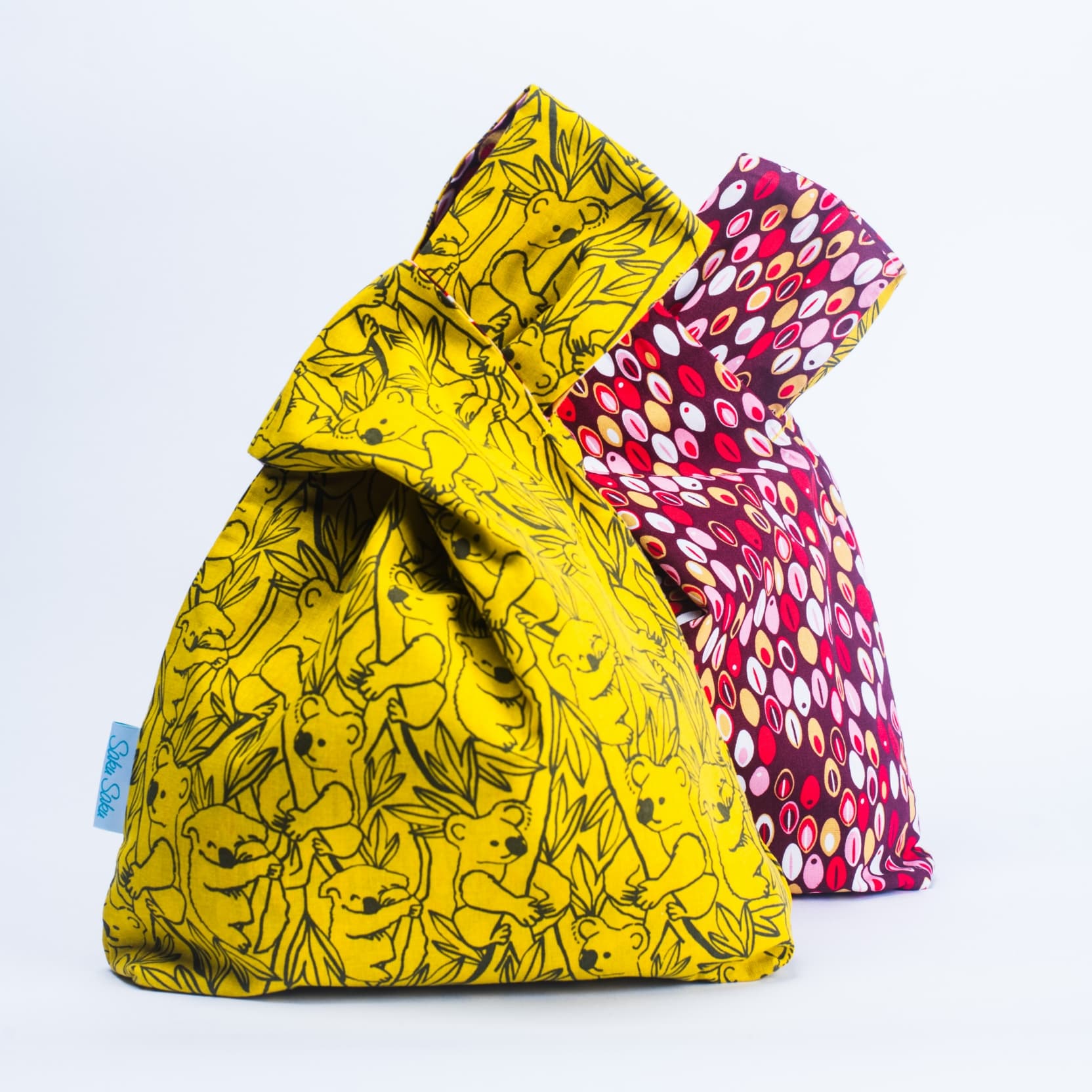 Réversible Kokoalas sur Eucalyptus et Nuances de Pétales Rouges – Image 2